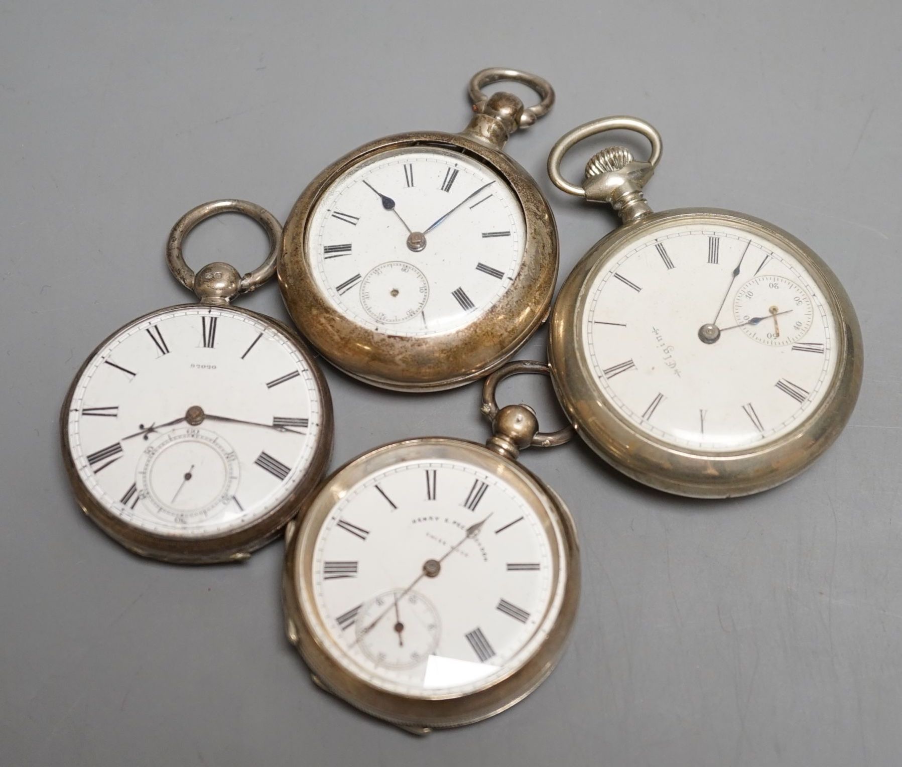 Two silver open face pocket watches including Henry Peck, London and two other pocket watches including Elgin.